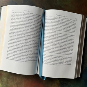 Moby Dick or the Whale-Herman Melville-1977 Easton Press Edition-classic American Literature-Gift Book-view of the inside content showing the attached satin page marker ribbon in a light blue to match the inside cover's endpapers