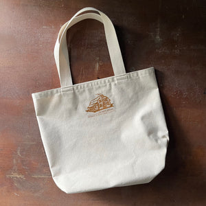 Log Cabin Vintage-canvas book tote bag-view of the back of the bag with the Log Cabin Logo shown with "Handmade in Historic Bucks County" written below the logo
