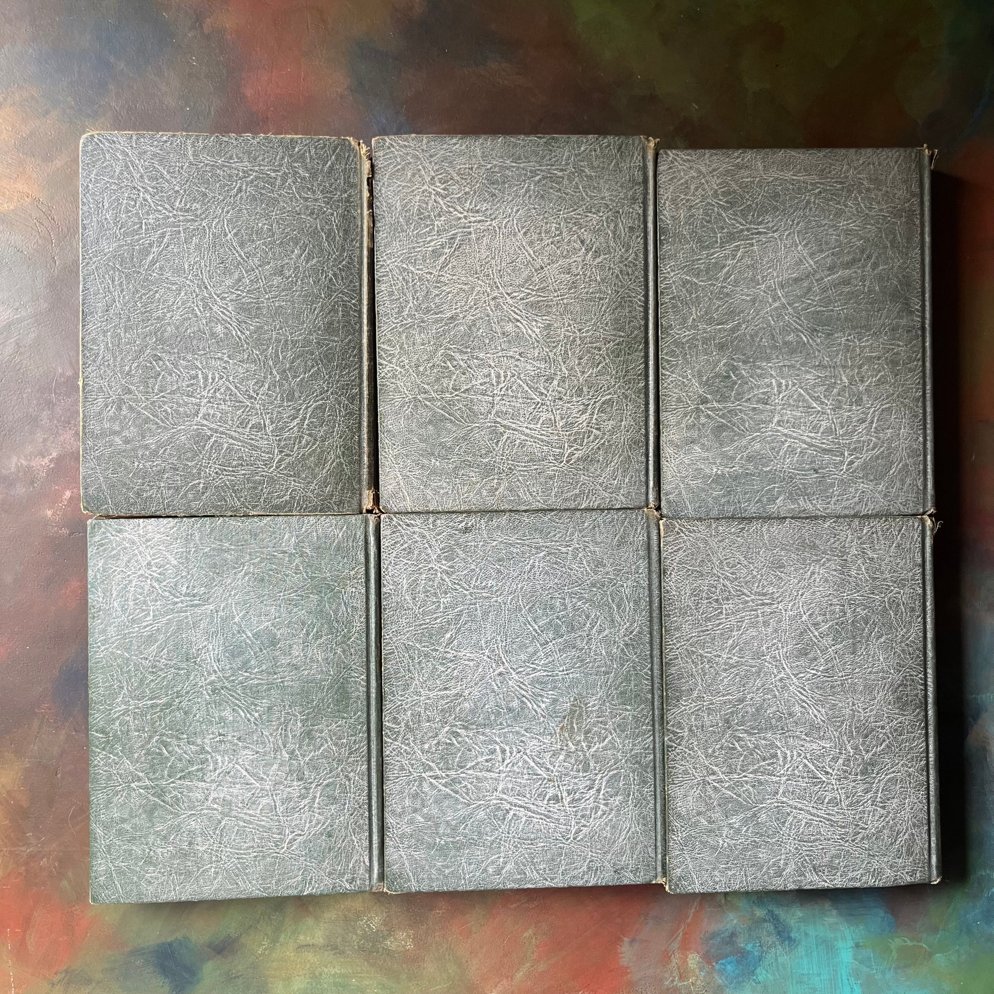 My Book House Complete Six-Volume Set by Olive Miller Beaupre-1925 Editions-vintage storybook set for children-view of the back covers - these are a white/gray & green marbled effect - they look dirty or discolored in the pictures but they are not