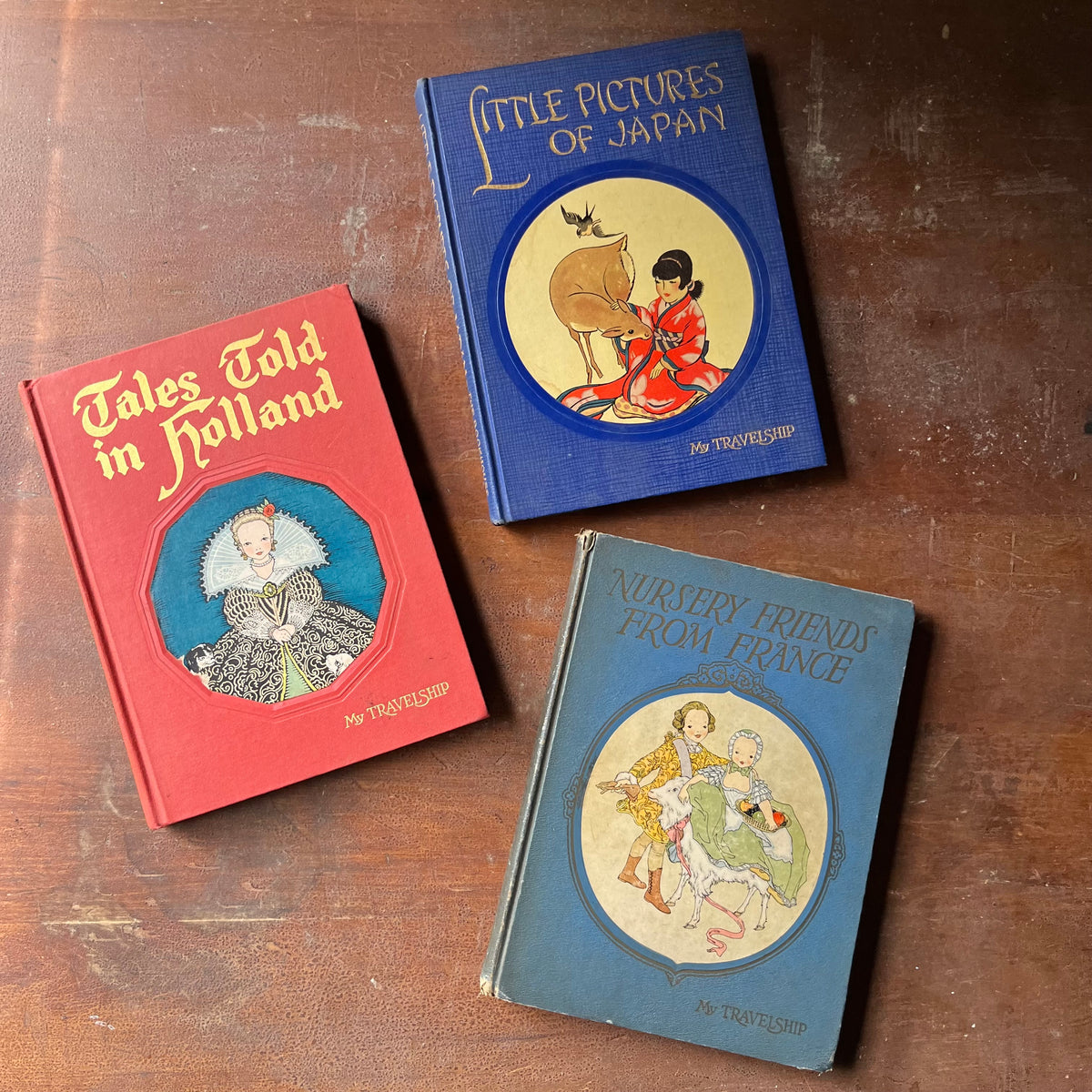 vintage children's storybooks , vintage children's books - My Travelship Book Set of 3: Nursery Friends from France, written by Olive Beaupre Miller with illustrations by Maud & Miska Petersham, Tales Told in Holland written by Olive Beaupre Miller with illustrations by Maud & Miska Petersham, and Little Pictures of Japan written by Olive Beaupre Miller with illustrations by Katharine Sturges - view of the front covers