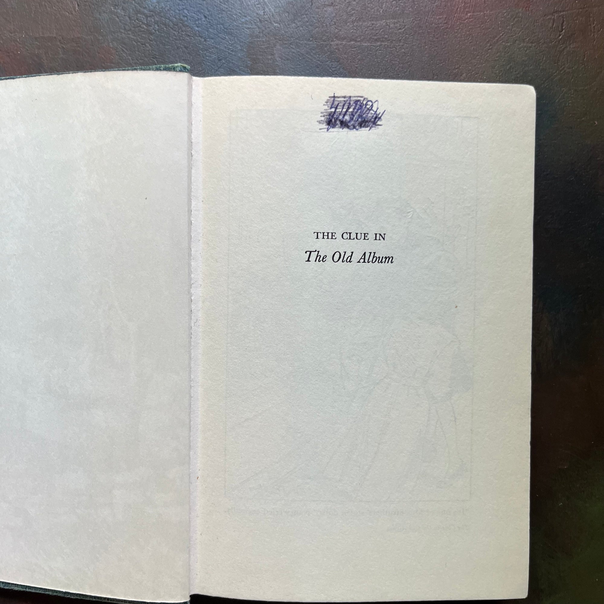 The Clue of the Broken Locket, The Clue in the Old Album, The Clue of the Leaning Chimney & The Witch Tree Symbol-view of the half title page of the Clue in the Old Album showing a name crossed out in ink