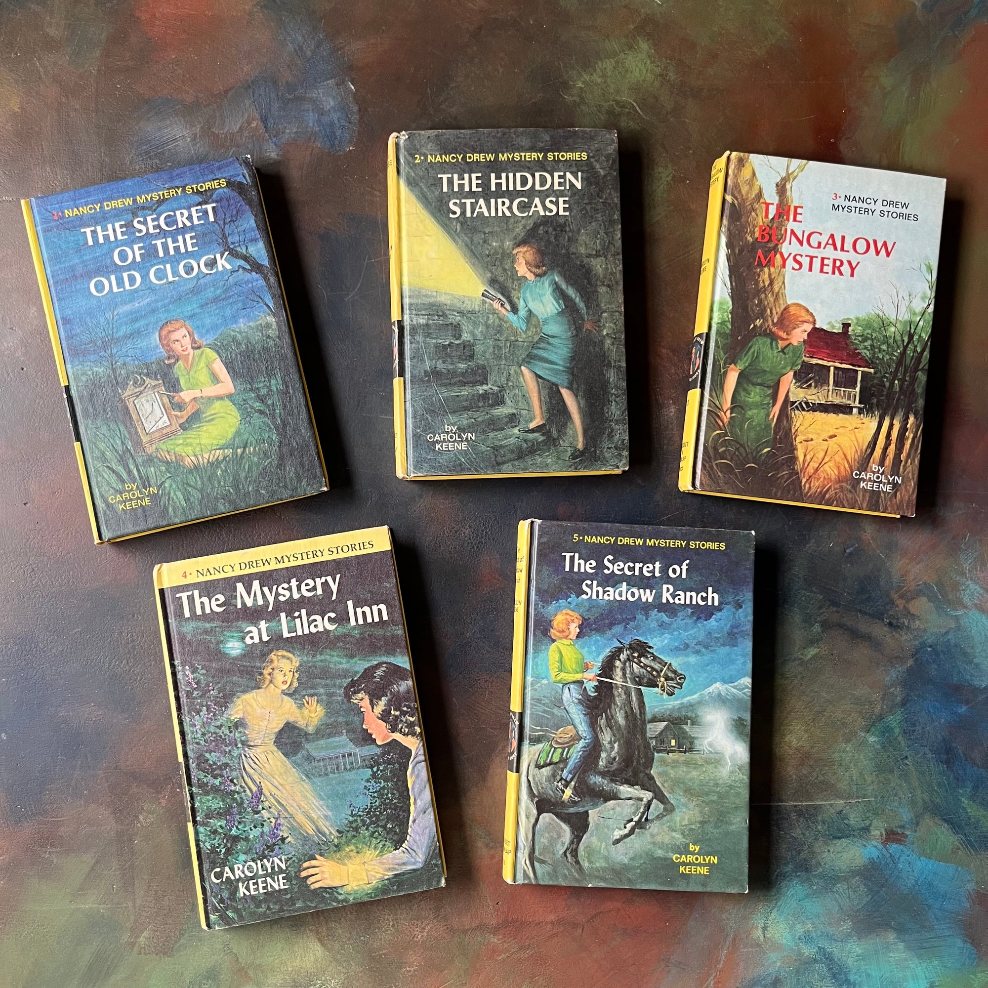 Nancy Drew Mystery Stories Starter Book Set Volumes 1-5 written by Carolyn Keene-vintage mystery books for girls-view of the front covers