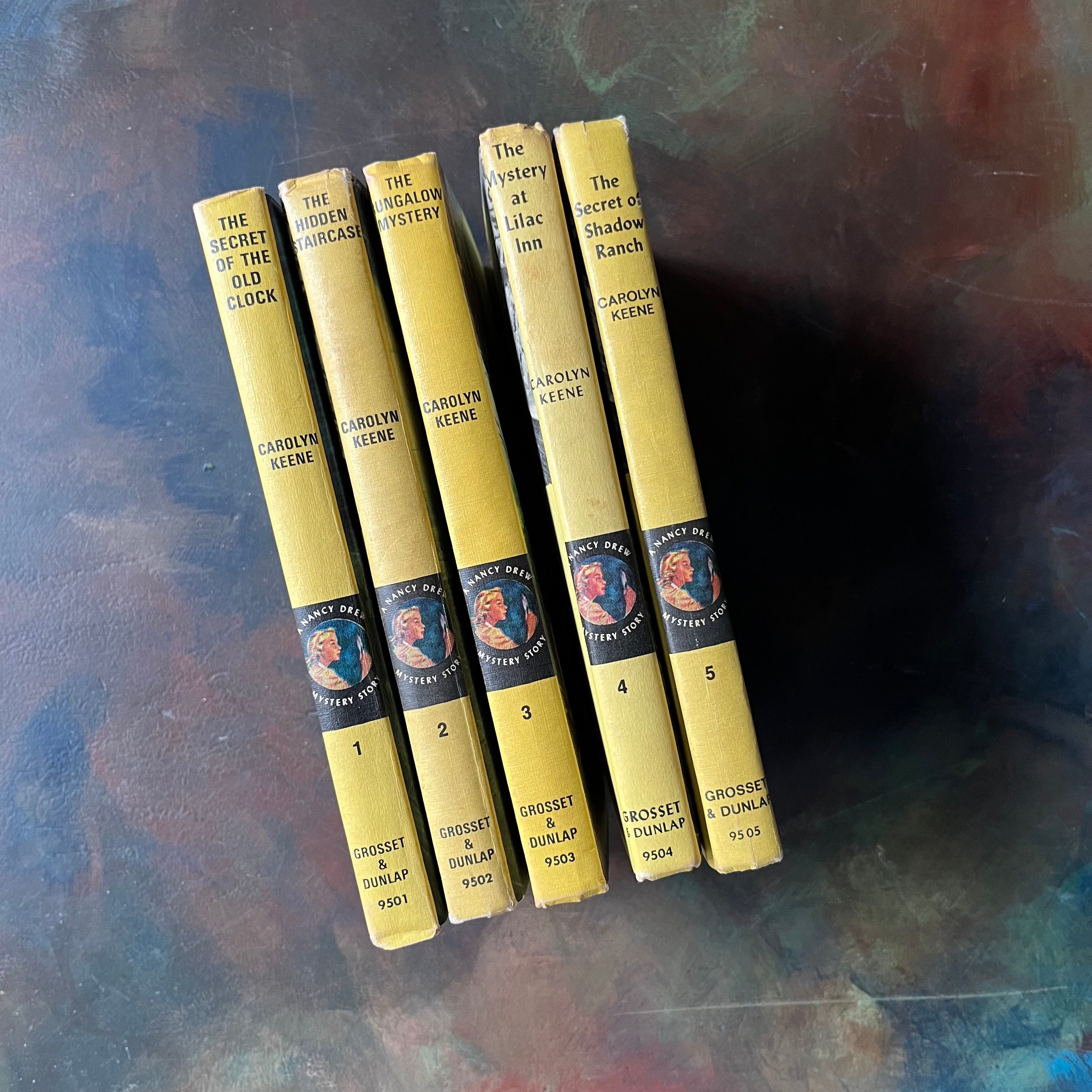 Nancy Drew Mystery Stories Starter Book Set Volumes 1-5 written by Carolyn Keene-vintage mystery books for girls-view of the spines