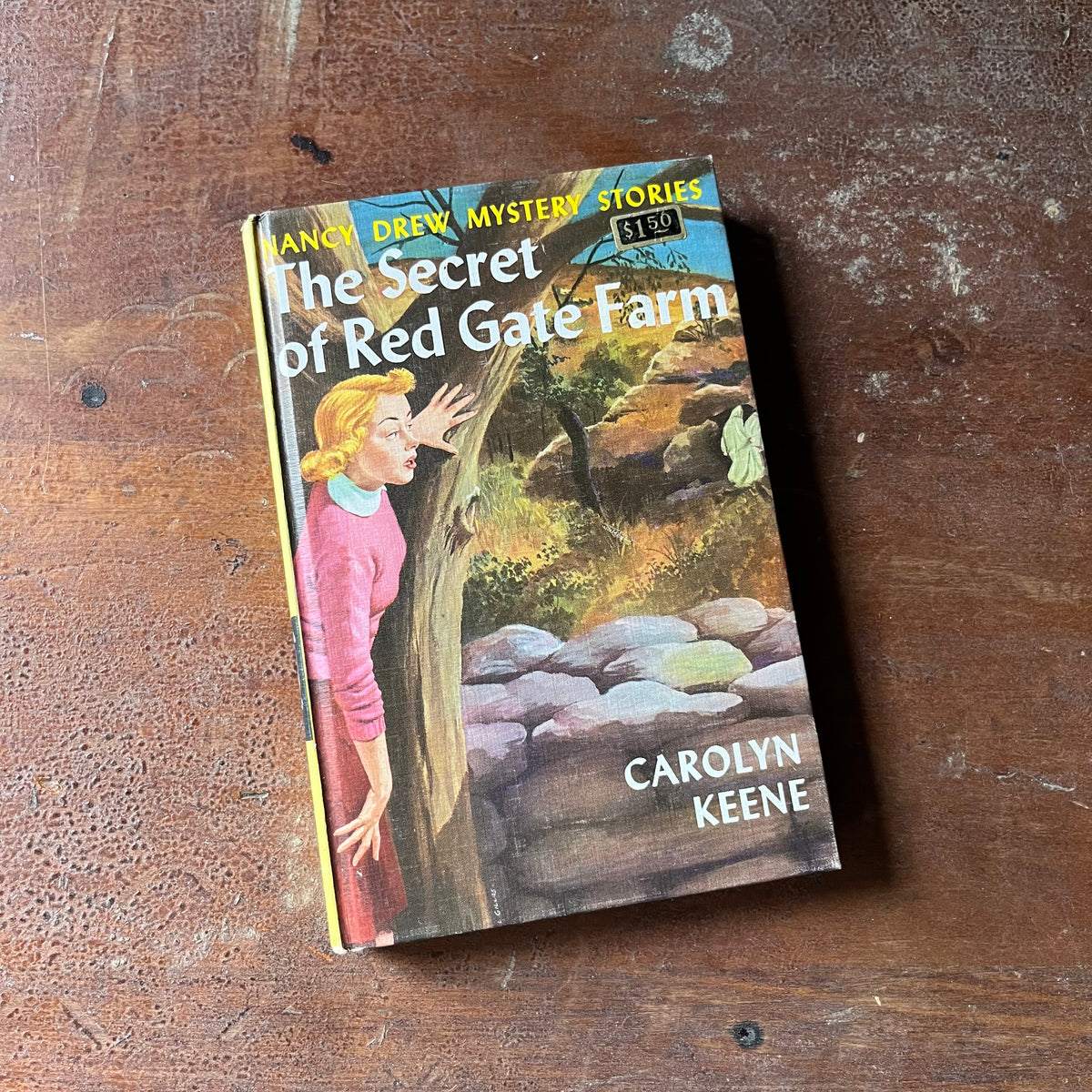 vintage children's chapter book, vintage adventure book for girls, Nancy Drew Mystery Stories - #6 The Secret of Red Gate Farm written by Carolyn Keene - view of the front cover with original price sticker at the top