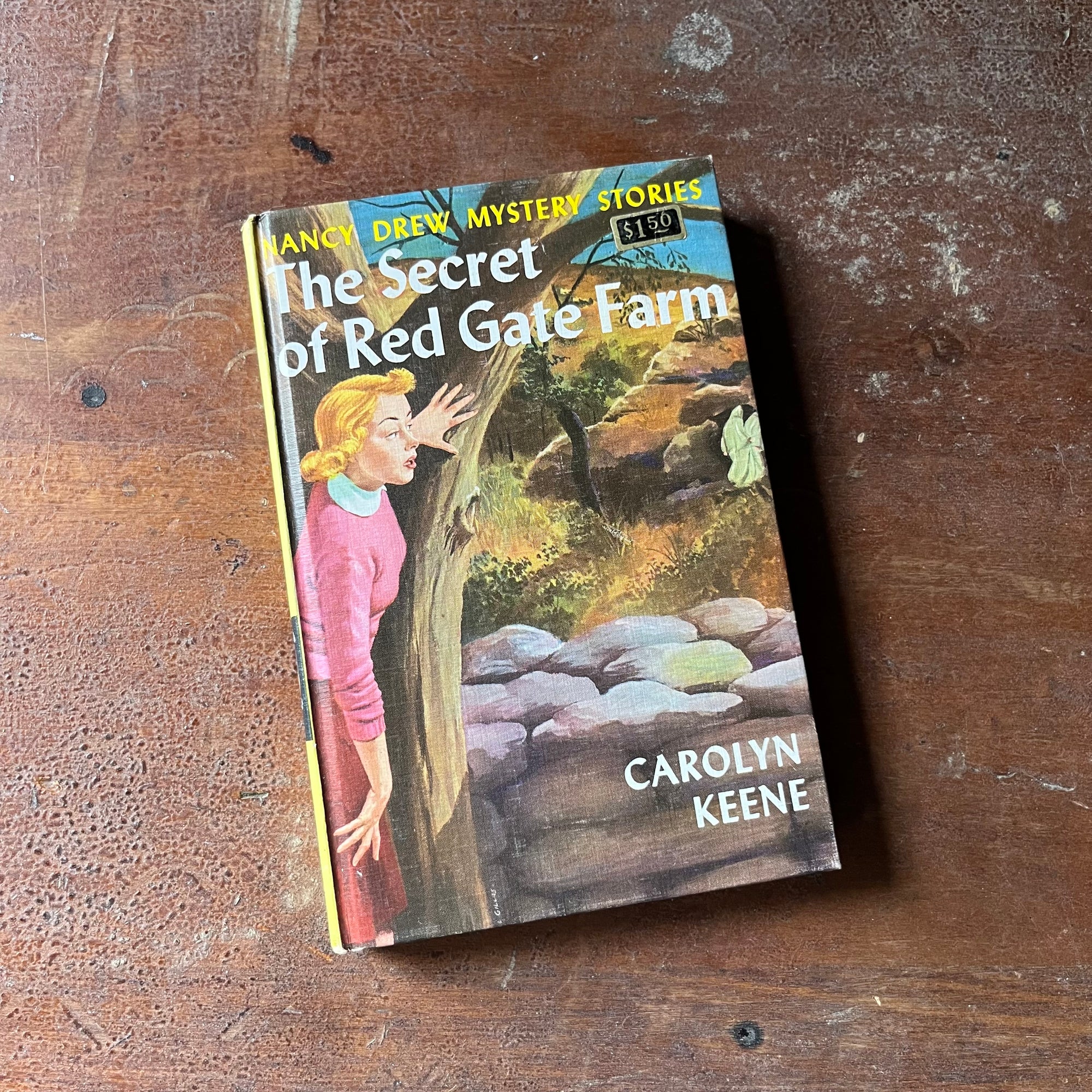 vintage children's chapter book, vintage adventure book for girls, Nancy Drew Mystery Stories - #6 The Secret of Red Gate Farm written by Carolyn Keene - view of the front cover with original price sticker at the top