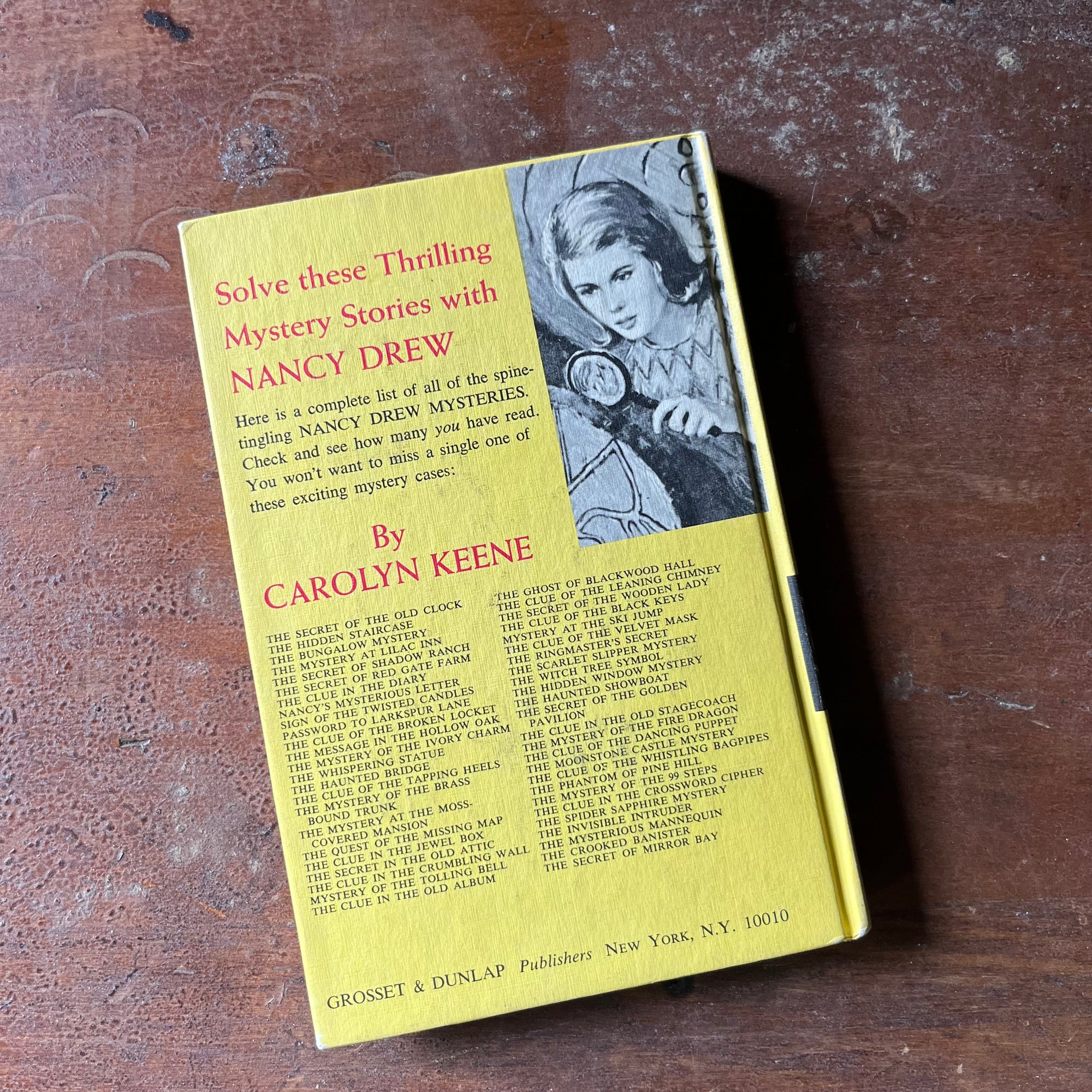vintage children's chapter book, vintage adventure book for girls, Nancy Drew Mystery Stories - #9 The Sign of the Twisted Candles written by Carolyn Keene - view of the back cover