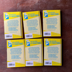 vintage children's chapter books, vintage book set - Nancy Drew Starter Set in Box Sleeve by Carolyn Keene-Volumes 1-6 - view of the back covers
