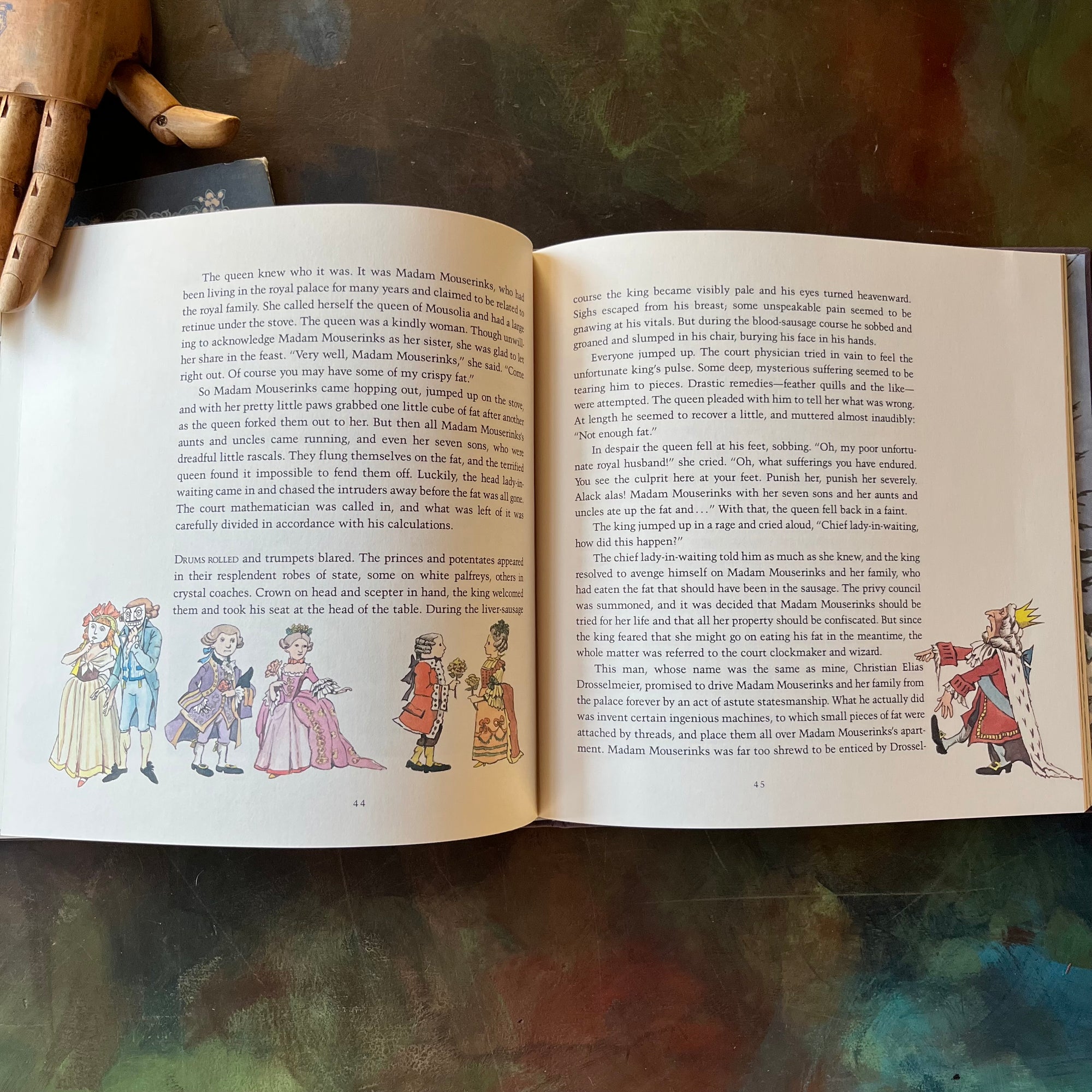 Nutcracker-Maurice Sendak-First Edition-vintage children's classic-Christmas Classic Children's Book-view of the content within the pages showing text and smaller illustrations around the bottom edges