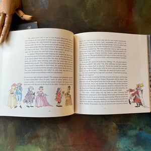 Nutcracker-Maurice Sendak-First Edition-vintage children's classic-Christmas Classic Children's Book-view of the content within the pages showing text and smaller illustrations around the bottom edges