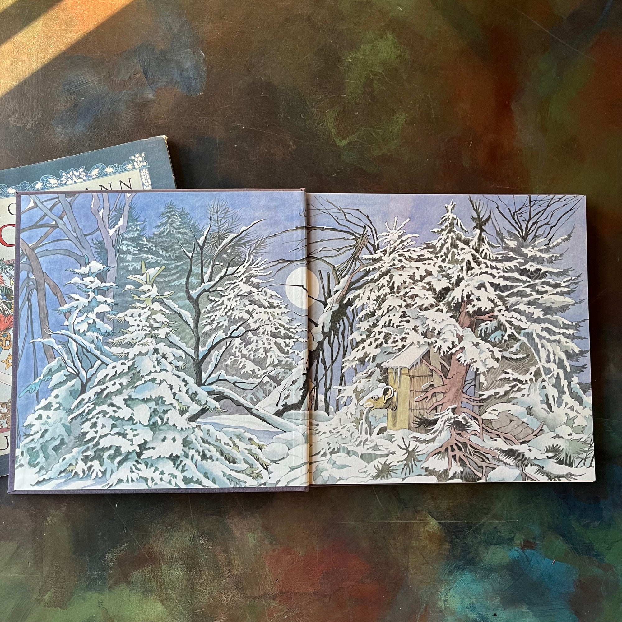 Nutcracker-Maurice Sendak-First Edition-vintage children's classic-Christmas Classic Children's Book-view of the inside cover with a detailed winter scene illustration