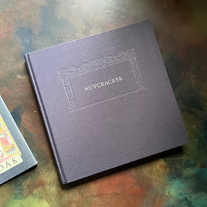 Nutcracker-Maurice Sendak-First Edition-vintage children's classic-Christmas Classic Children's Book-view of the clothbound front cover in Navy Blue and Silver