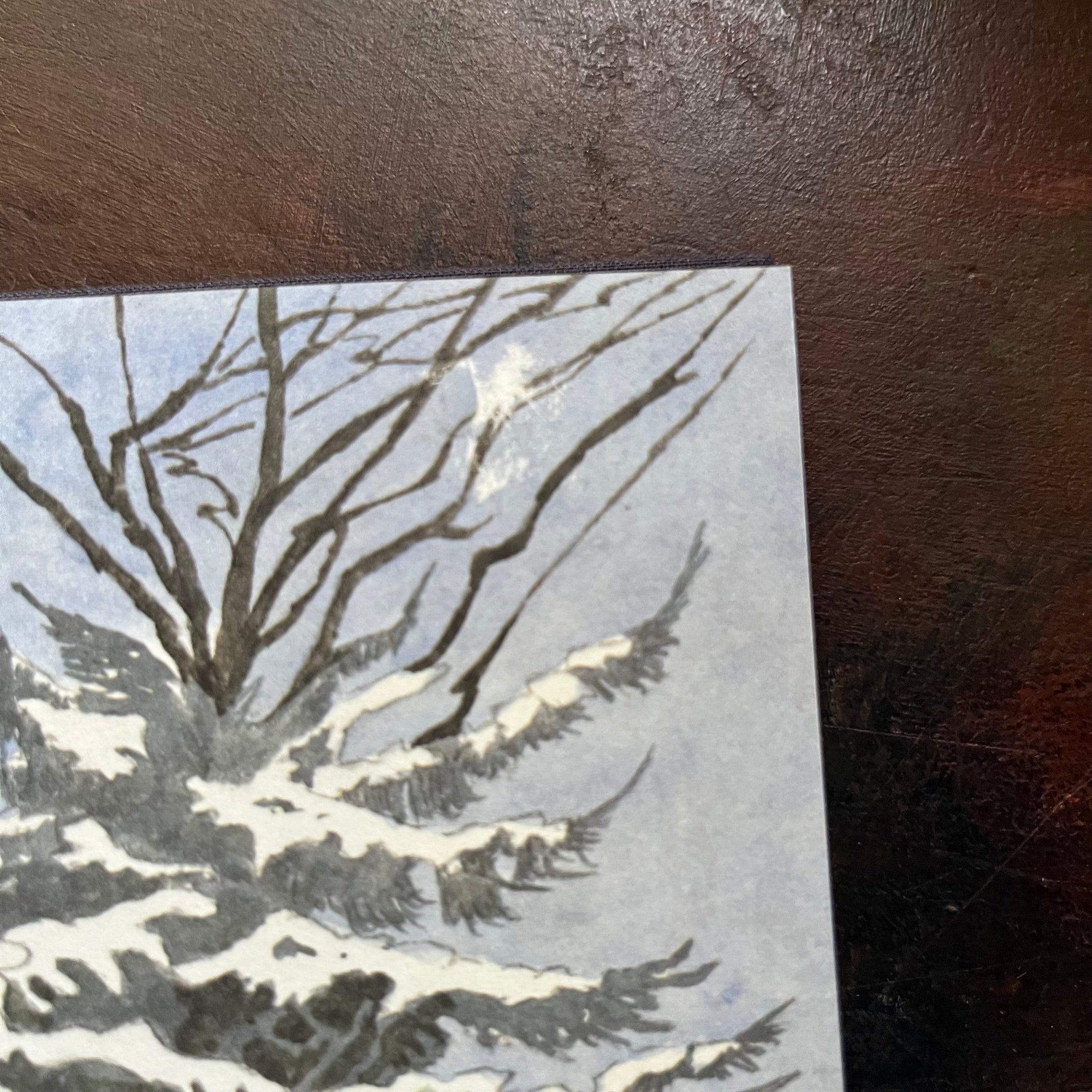 Nutcracker-Maurice Sendak-First Edition-vintage children's classic-Christmas Classic Children's Book-view of the condition of the inside cover - minor damage in the bare tree portion of the image