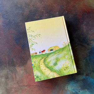 On the Banks of Plum Creek written by Laura Ingalls Wilder with illustrations by Garth Williams. This is a 1953 Edition by Harper & Row Publishers, New York & Evanston.  It was a 1938 Newbery Honor Book. 
 It is a vintage children's chapter book & living book.  View of the back cover.