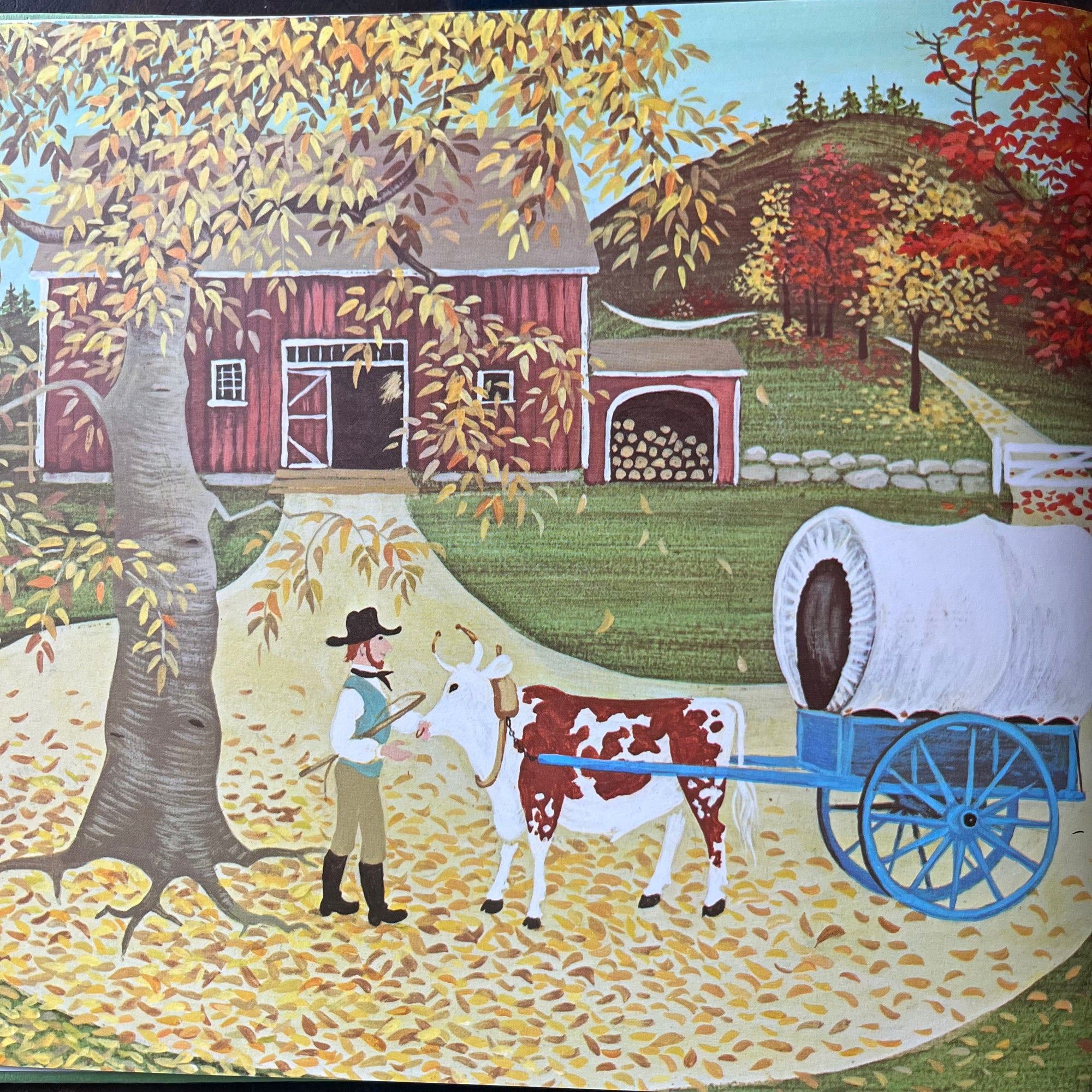 Ox-Cart Man written by Donald Hall with illustrations by Barbara Cooney-vintage children's picture book-1980 Caldecott Medal Winner-view of the closeup of the cover image taken from inside the book