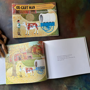 Ox-Cart Man written by Donald Hall with illustrations by Barbara Cooney-vintage children's picture book-1980 Caldecott Medal Winner-view of the first illustration of the book - the most iconic from the book - this illustration was also used as the cover page image