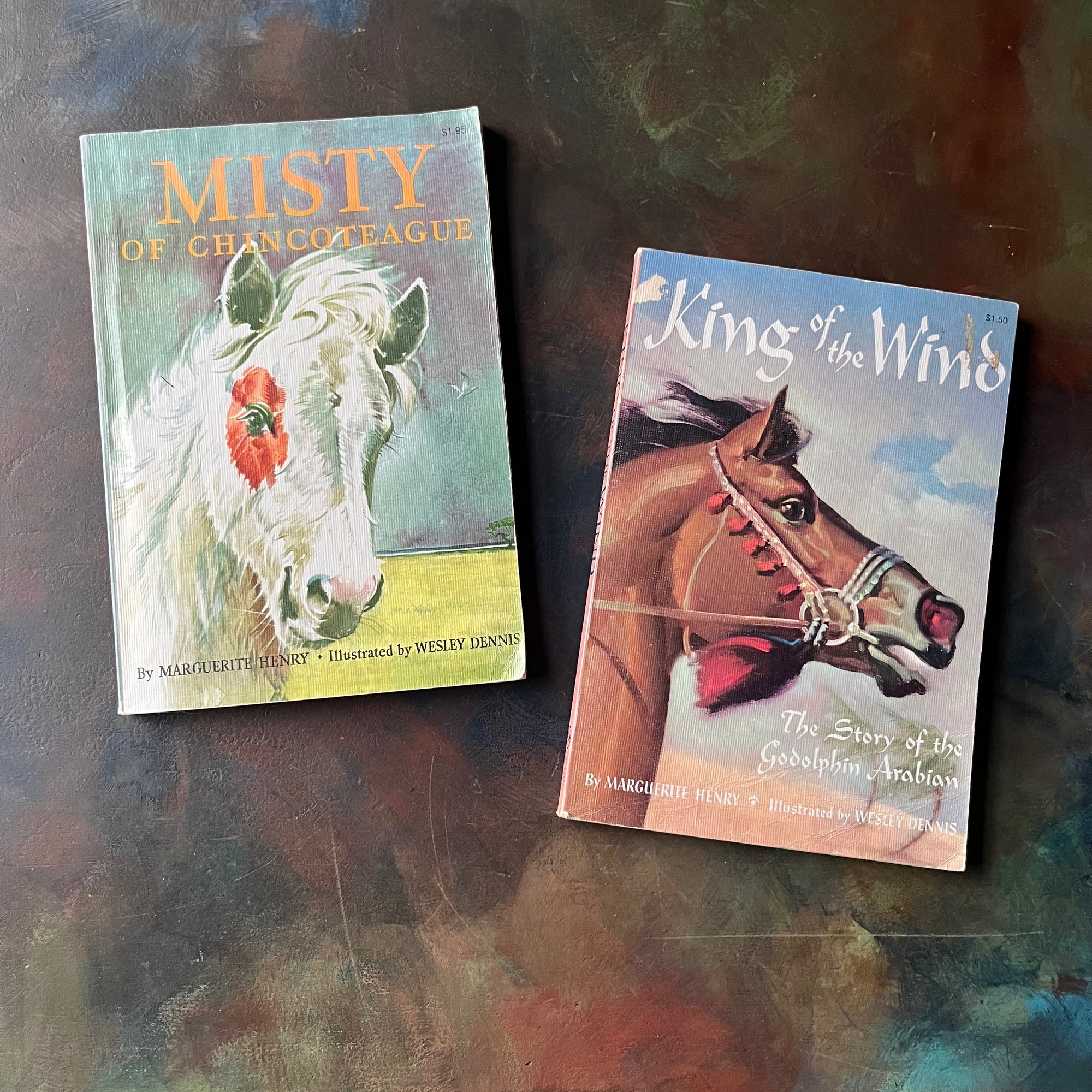 Pair of Margeurite Henry Horse Books-Misty of Chincoteague-King of the Wind-Newbery Award Book-vintage children's horse stories-view of the front covers.
