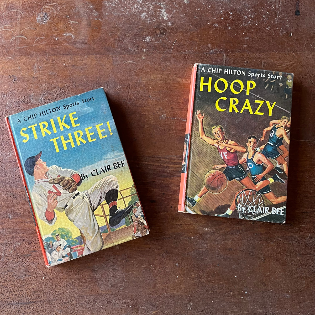 Pair of Chip Hilton Sports Story by Clair Bee-#3 Strike Three and #5 Hoop Crazy-vintage children's chapter sports books-view of the colorful front covers with illustrations from each book