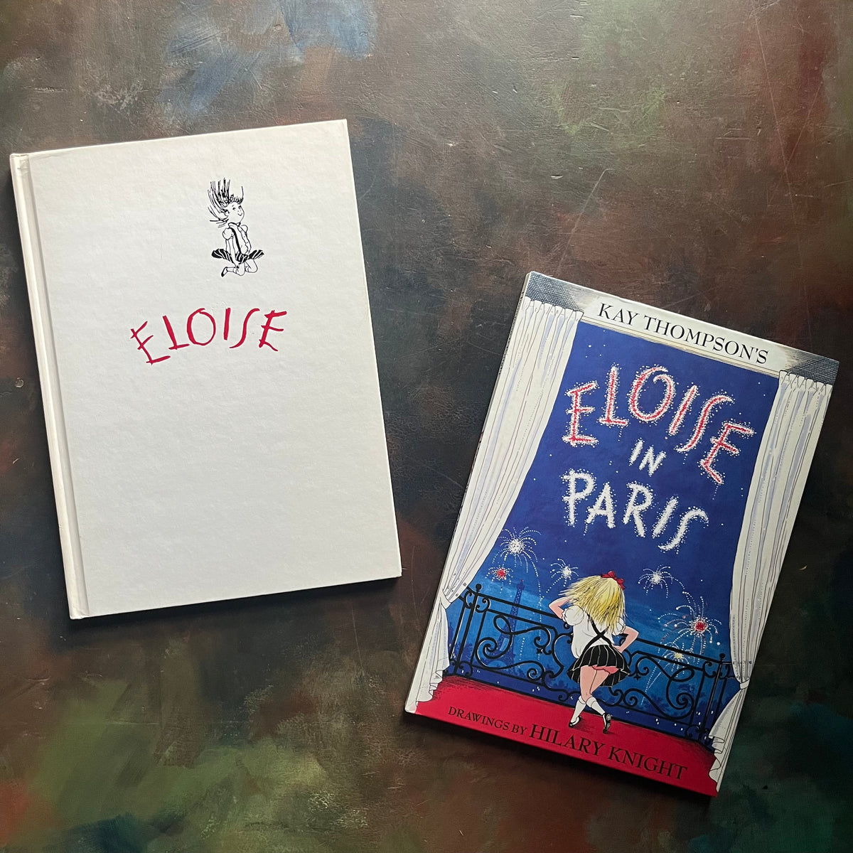Pair of Eloise Books written by Kay Thompson-Eloise-Eloise in Paris-with illustrations by Hilary Knight-vintage children's picture books-view of the front covers