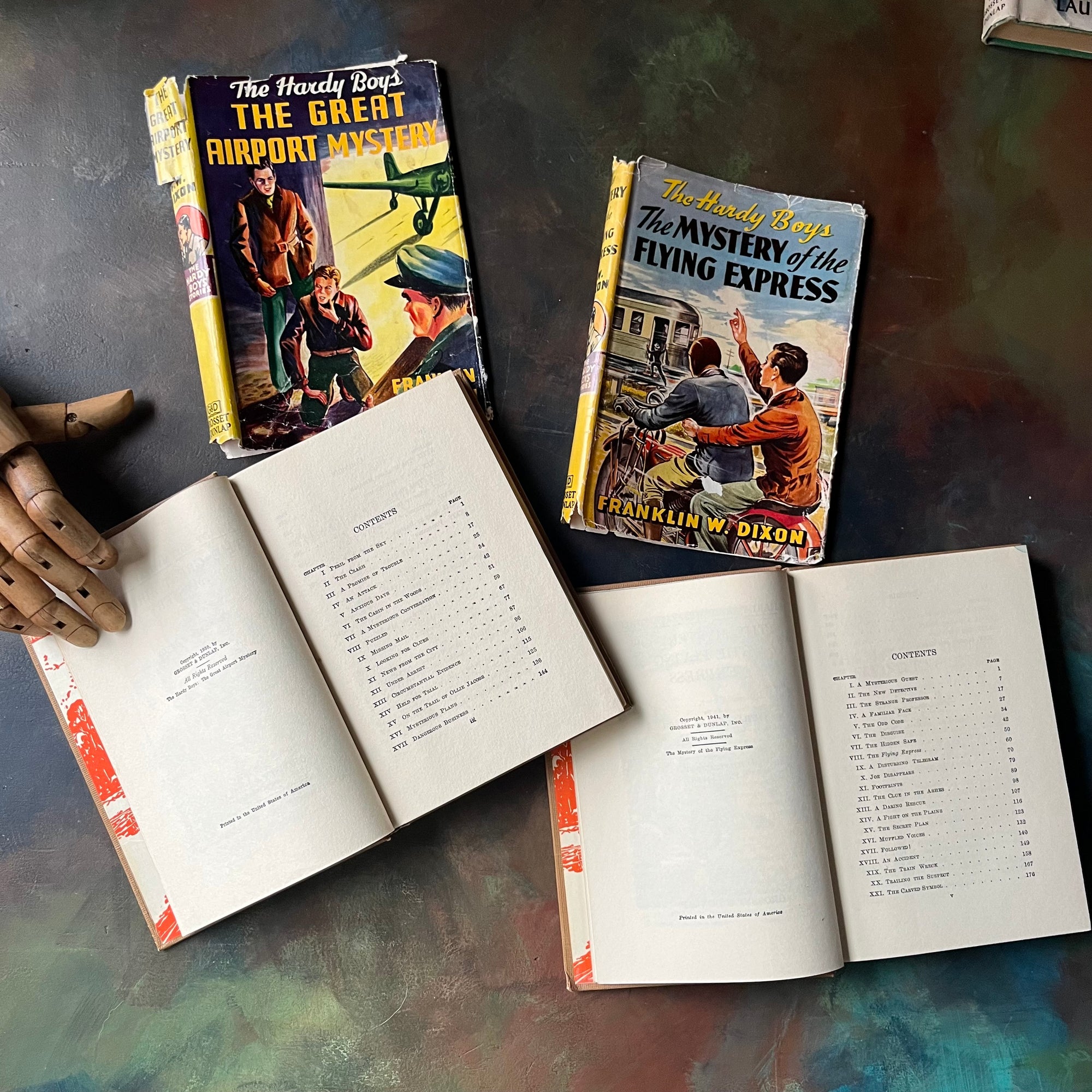 Pair of Hardy Boys Mysteries written by Franklin W. Dixon-The Great Airport Mystery-The Mystery of the Flying Express-vintage children's mysteries-view of the copyright & contents pages