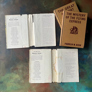 Pair of Hardy Boys Mysteries written by Franklin W. Dixon-The Great Airport Mystery-The Mystery of the Flying Express-vintage children's mysteries-view of the dust jacket's inside flaps