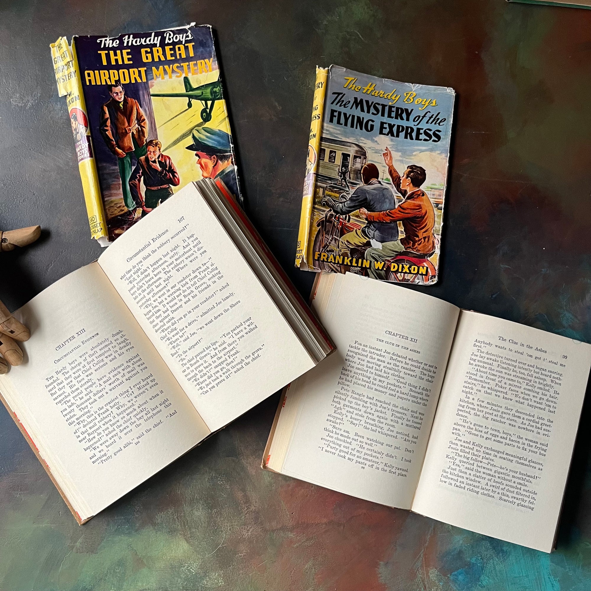 Pair of Hardy Boys Mysteries written by Franklin W. Dixon-The Great Airport Mystery-The Mystery of the Flying Express-vintage children's mysteries-view of the inside content