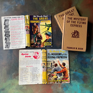 Pair of Hardy Boys Mysteries written by Franklin W. Dixon-The Great Airport Mystery-The Mystery of the Flying Express-vintage children's mysteries-view of the outside of the dust jackets