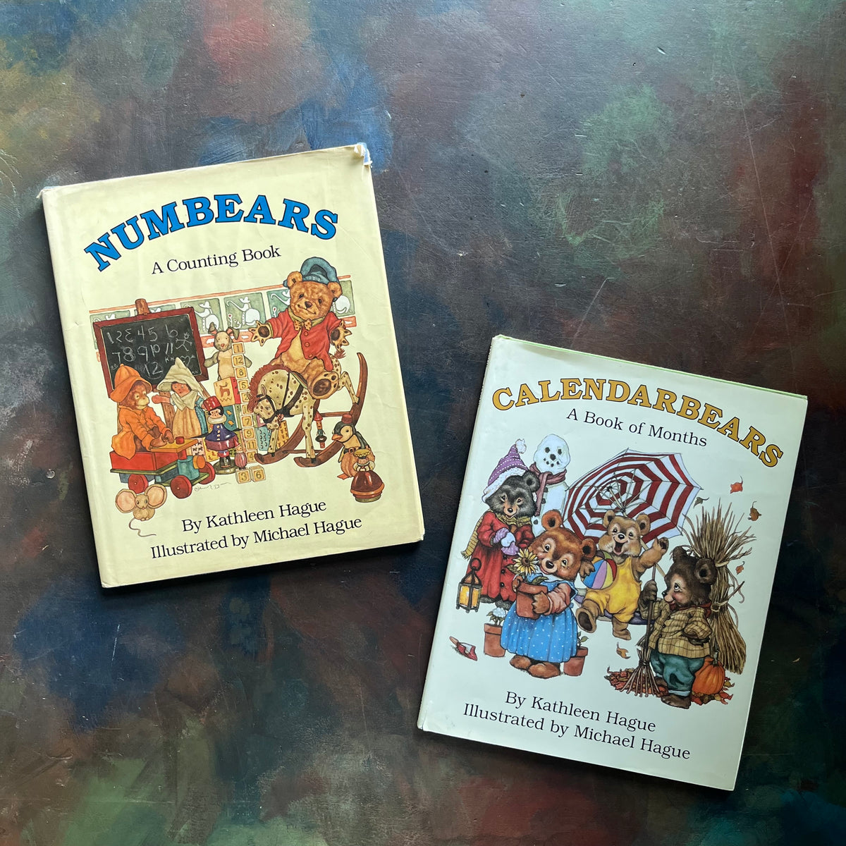 Pair of vintage picture books written by Kathleen Hague and illustrated by Michael Hague-Numbears-Calendarbears-view of the dust jacket's covers with images from each book depicted on each covers 