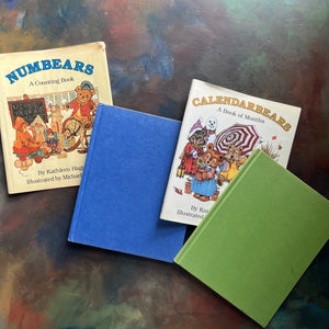 Pair of vintage picture books written by Kathleen Hague and illustrated by Michael Hague-Numbears-Calendarbears-view of the clothbound covers in blue and green