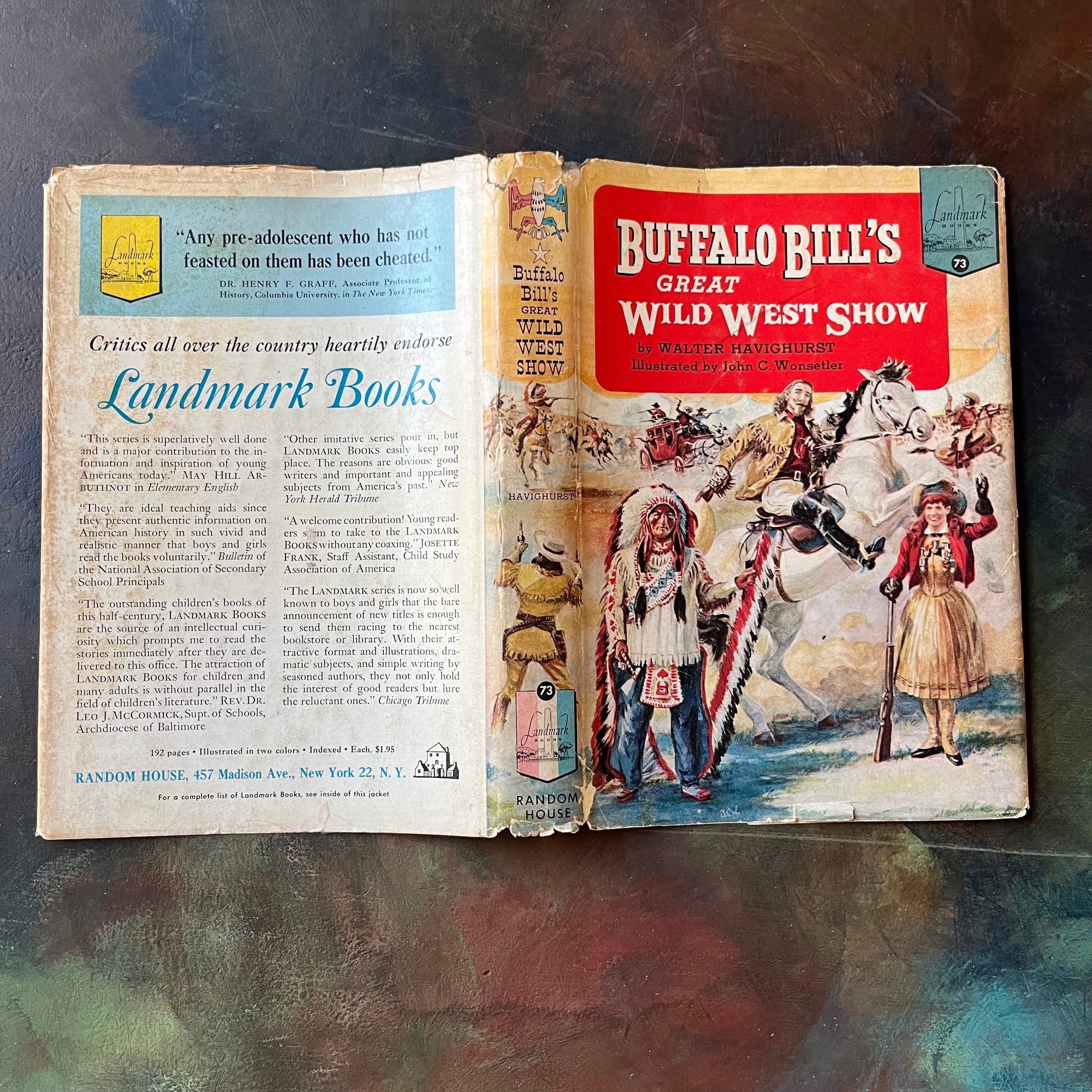 Pair of Landmark Series History Books for Children-Buffalo Bill's Great Wild West Show-Wild Bill Hickok Tames The West-vintage children's books-view of the outside of the dust jacket for The Buffalo Bill book.