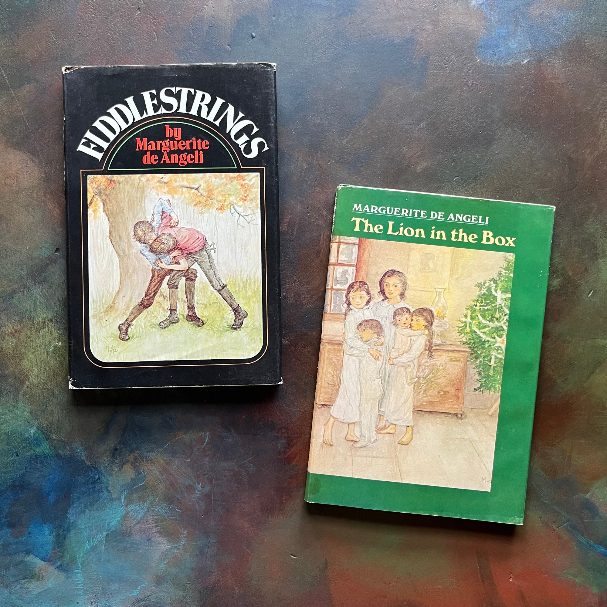 Pair of Marguerite de Angeli Books-The Lion in the Box and Fiddlestrings-first editions-vintage children's chapter books-view of the dust jacket's front covers