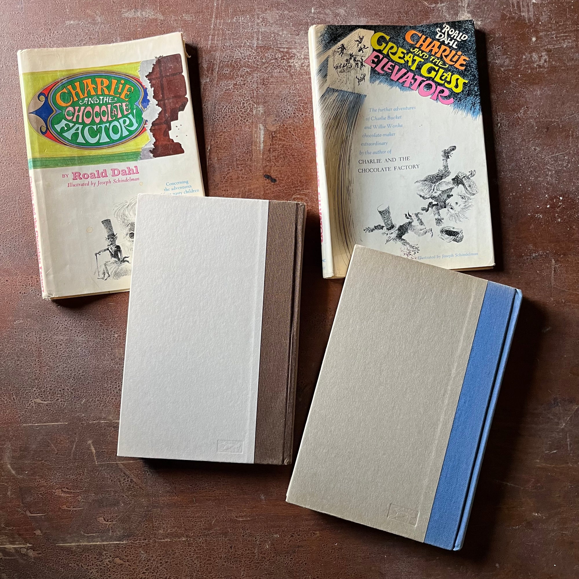 vintage children's chapter books - Pair of Roald Dahl Books-Charlie & The Chocolate Factory and Charlie & The Great Glass Elevator with illustrations by Joseph Schindelman - view of the back covers