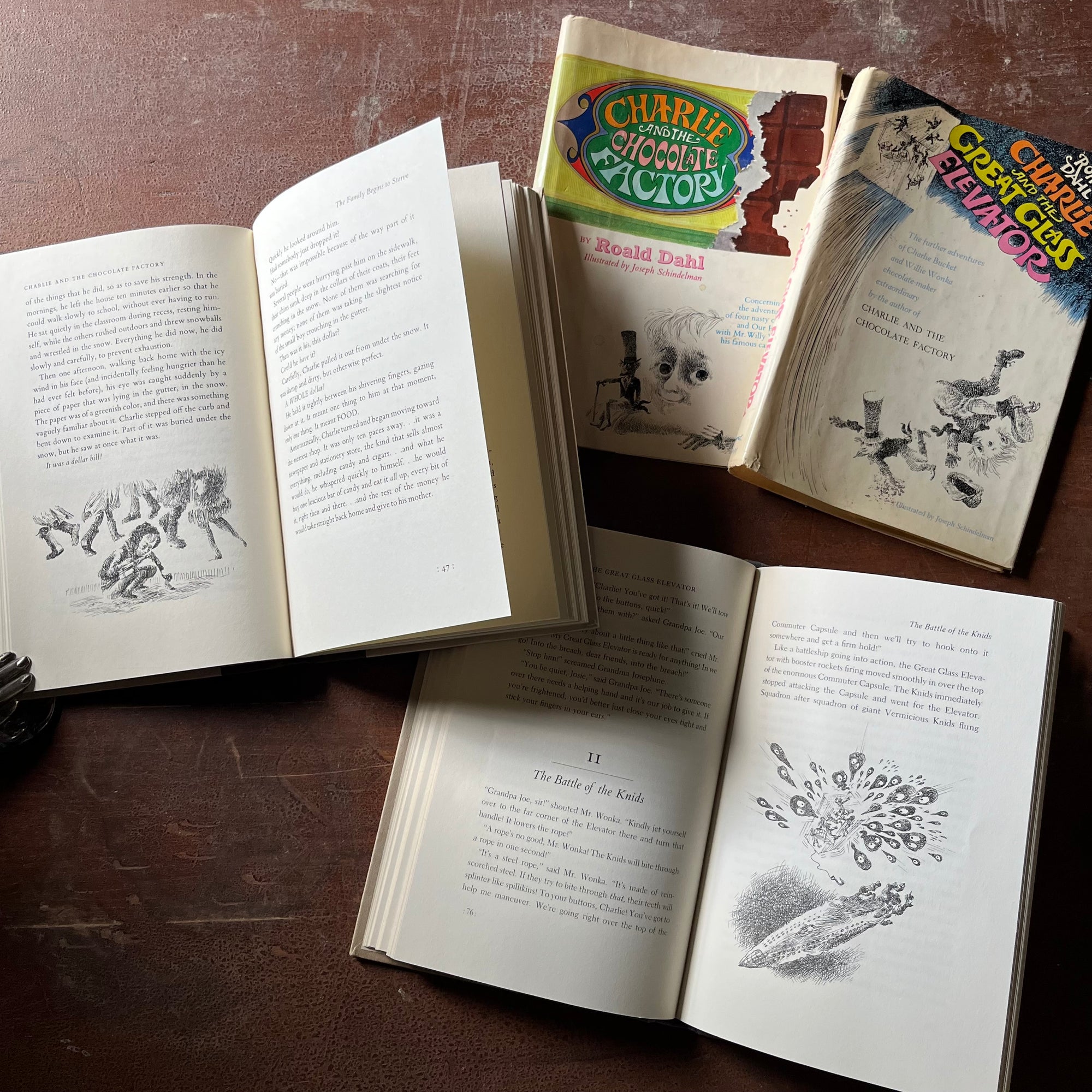 vintage children's chapter books - Pair of Roald Dahl Books-Charlie & The Chocolate Factory and Charlie & The Great Glass Elevator with illustrations by Joseph Schindelman - view of samples of the illustrations in each book