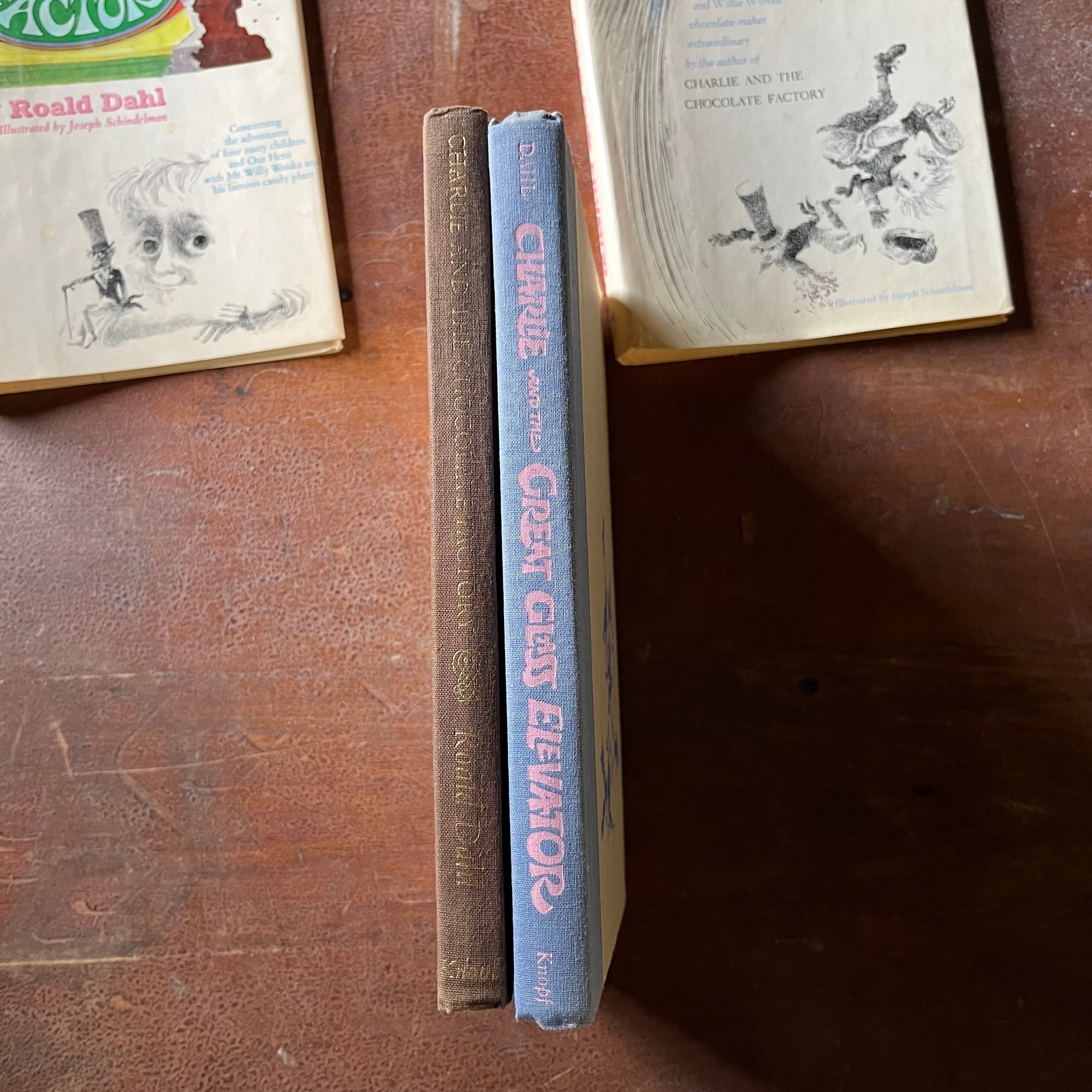 vintage children's chapter books - Pair of Roald Dahl Books-Charlie & The Chocolate Factory and Charlie & The Great Glass Elevator with illustrations by Joseph Schindelman - view of the spines