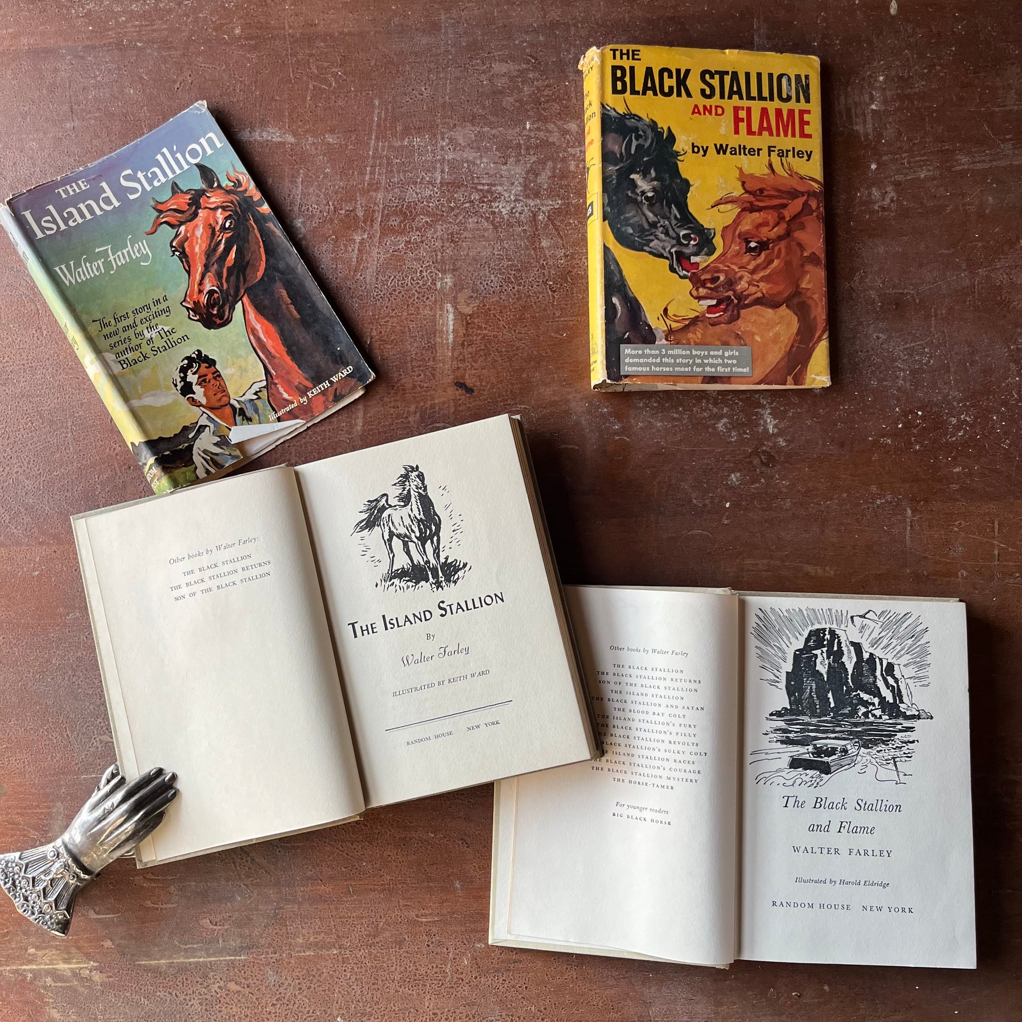 Pair of The Black Stallion Books-The Island Stallion and The Black Stallion & Flame-written by Walter Farley-vintage children's chapter books-view of the title pages
