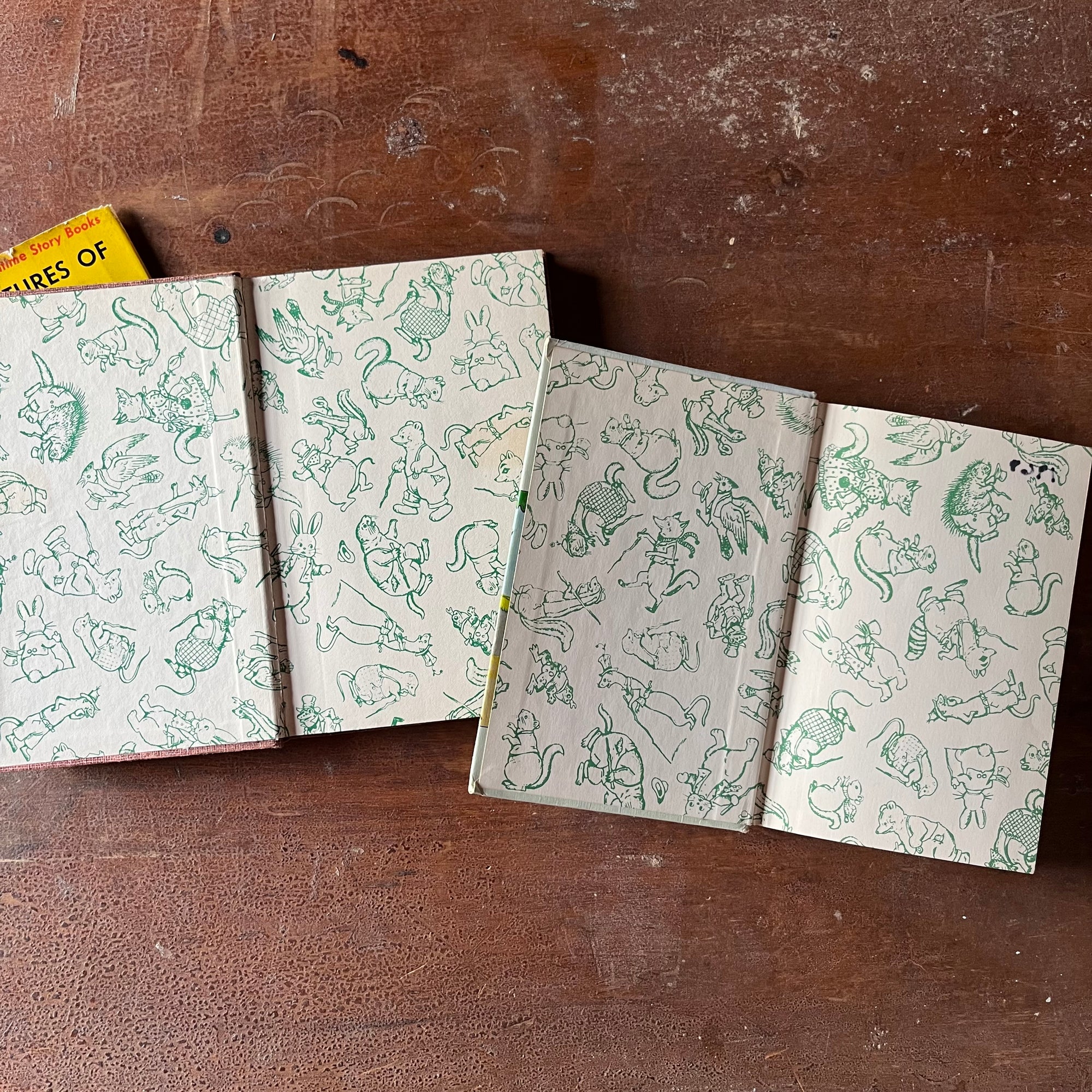 Pair of Thorton W. Burgess Books: The Adventures of Sammy Jay & Mother West Wind's Animal Friends - vintage children's storybooks - view of the inside covers with illustrations of Burgess's characters from different books - all in green