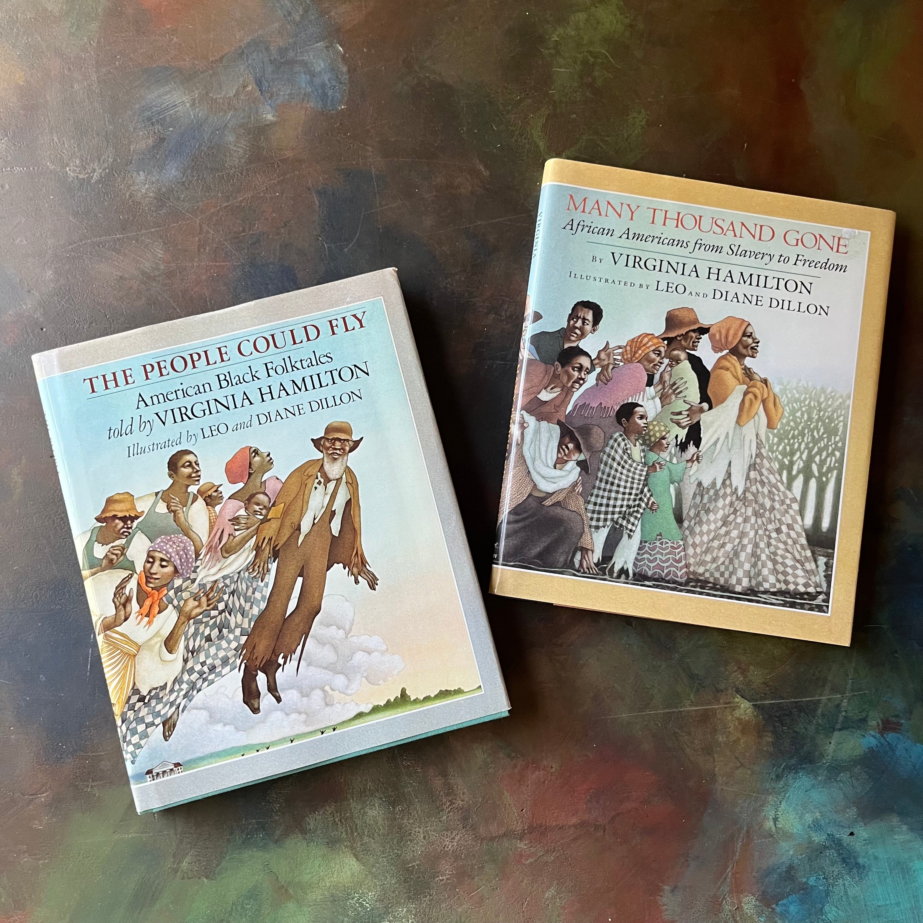 Pair of books written by Virginia Hamilton-The People Could Fly-Many Thousand Gone-Illustrated by Leo and Diane Dillon-American Black Folktales-children's stories-US History-African American History-view of the dust jacket's front covers
