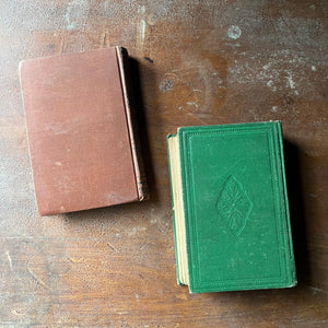 antique books, antique fiction books - Pair of books written by Ouida-A House Party (an Arlington Edition) & Signa - view of the embossed back covers