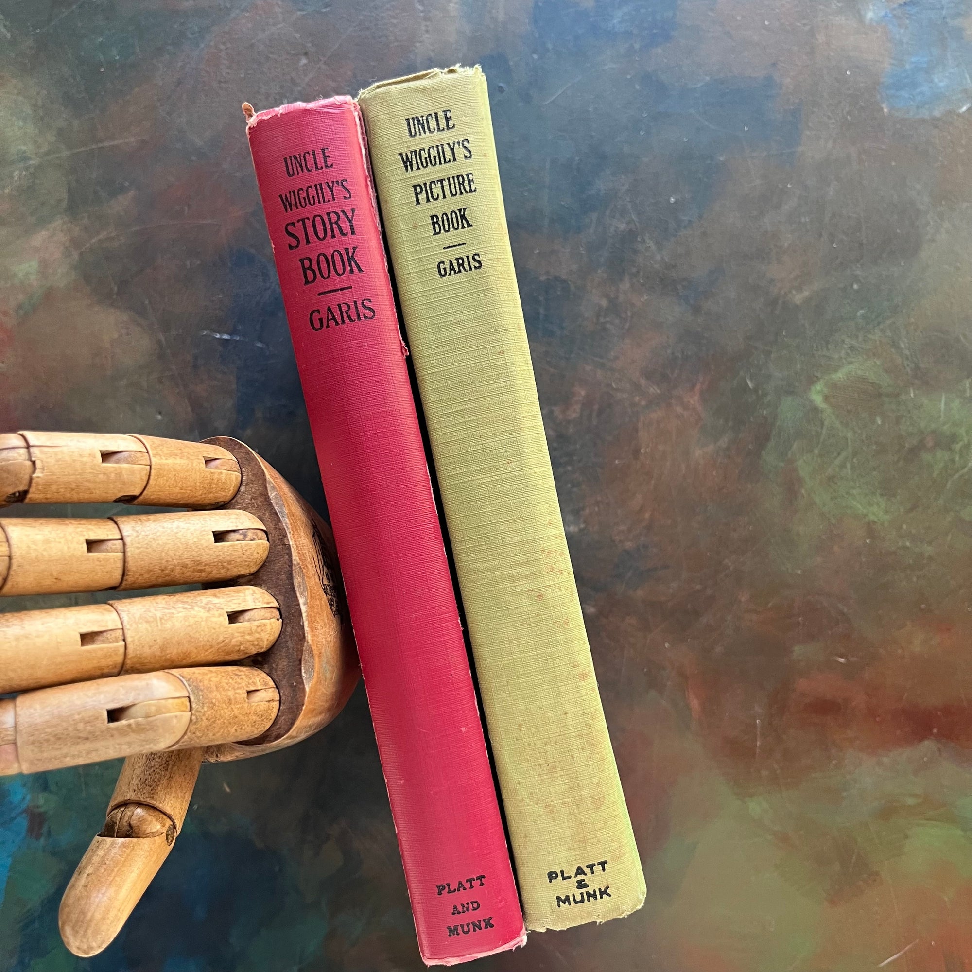 Pair of storybooks written by Howard R. Garis-Uncle Wiggily's Picture Book and Uncle Wiggily's Story Book-vintage children's chapter books-read aloud favorites-view of the spines