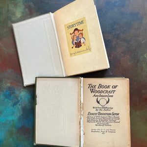 Pair of vintage living nature guides for children and young adults-The Burgess Animal Book for Children written by Thornton W. Burgess and The Book of Woodcraft written by Ernest Thompson Seton-view of the inside covers - note the missing pages of The Book of Woodcraft
