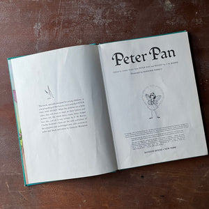 Peter Pan by J. M. Barrie with illustrations by Marjorie Torrey-A 1957 Random House Book-view of the title page with tinker bell in the middle - the copyright information is also listed on this page as well