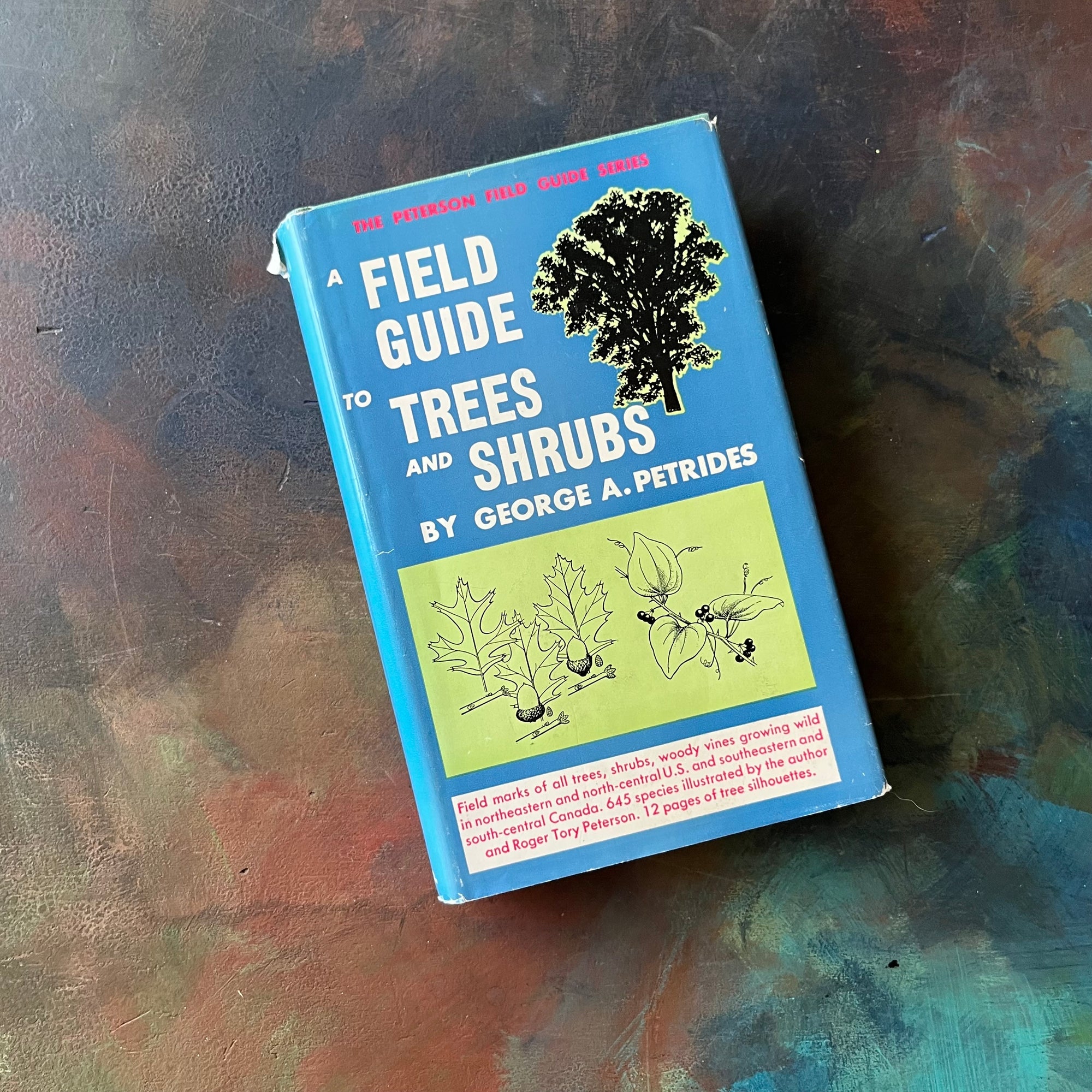 Peterson Field Guide Series-A Field Guide to Trees & Shrubs-Written by George A. Petrides-vintage nature guide-view of the dust jacket's front cover