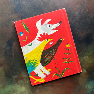 Petunia- written and illustrated by Roger-Duvoisin-vintage 1950's children's picture book-view of the back cover with a dog, rooster and chicken looking towards Petunia on the front cover 