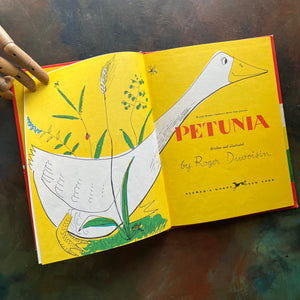 Petunia- written and illustrated by Roger-Duvoisin-vintage 1950's children's picture book-view of the inside cover with another illustration of Petunia in grass with flowers