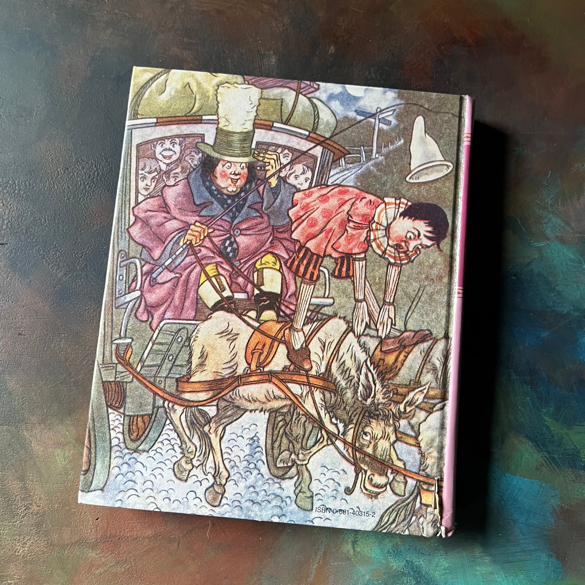 Pinocchio written by Carlo Collodi with illustrations by Charles Folkard-1987 Longmeadow Pres Edition-classic children's literature-vintage children's chapter book-view of the back cover