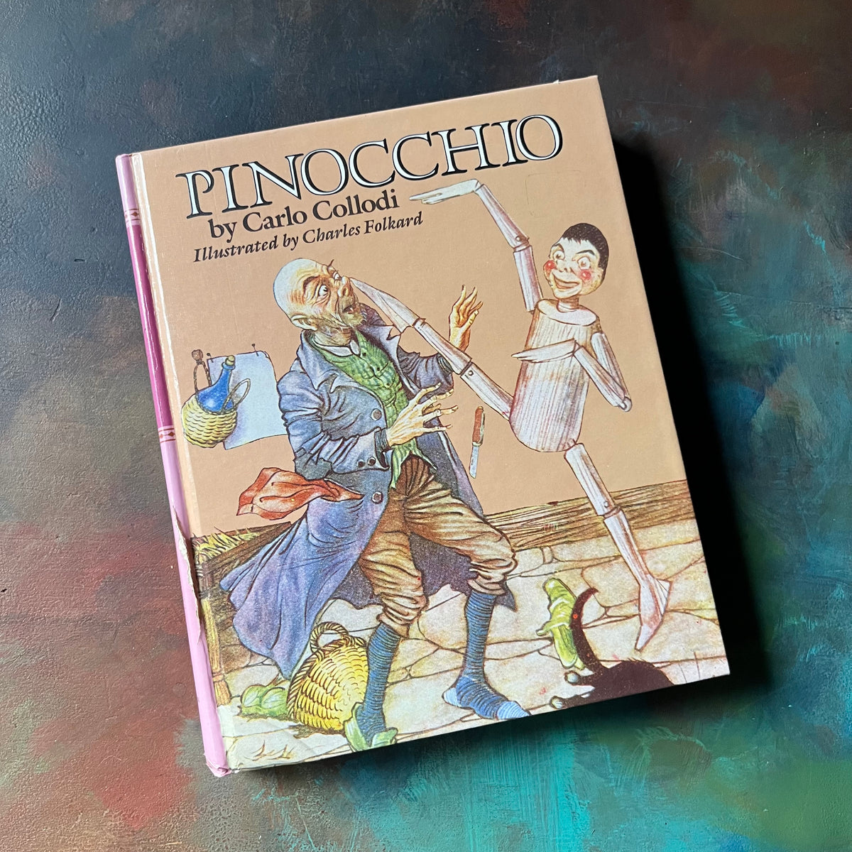 Pinocchio written by Carlo Collodi with illustrations by Charles Folkard-1987 Longmeadow Pres Edition-classic children's literature-vintage children's chapter book-view of the front cover