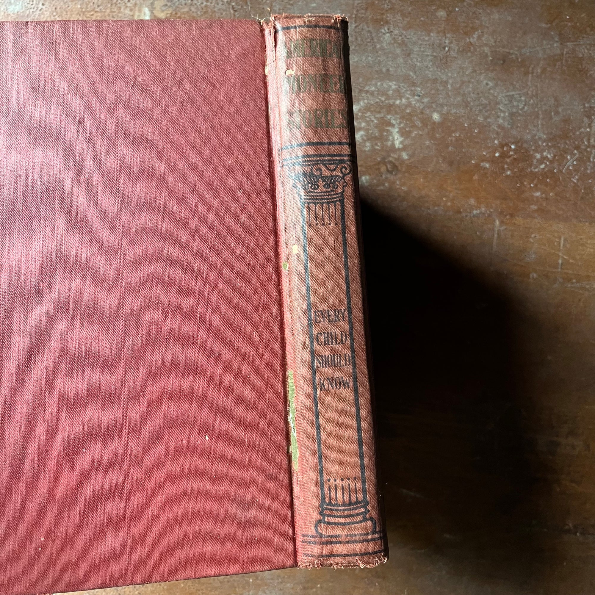 vintage children's chapter books - Pioneer Stories Every Child Should Know Leatherstocking Tales written by J. Fenimore Cooper - view of the condition of the spine - note the crack near the bottom of left-hand side of the spine