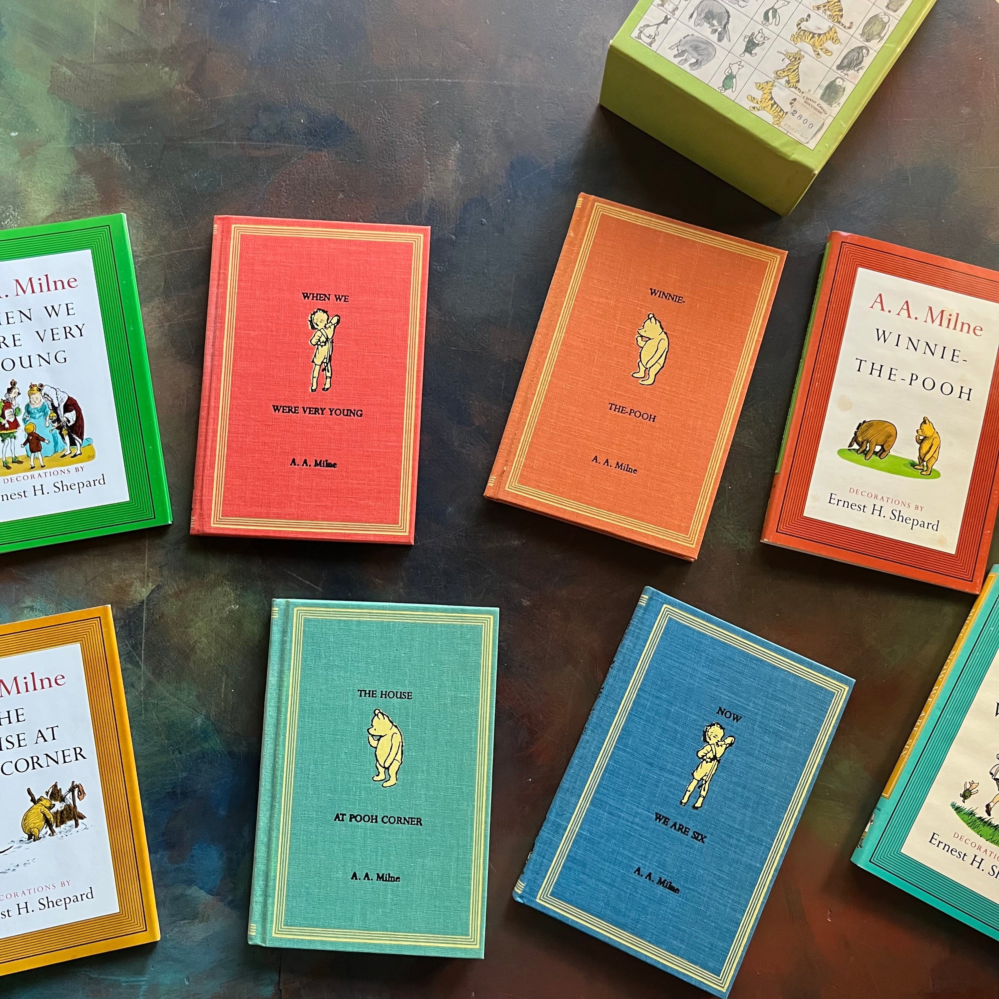Pooh's Library - Winnie the Pooh Box Set-A. A. Milne-E. H. Shepard-read aloud revival books-vintage children's short stories-view of the clothbound front covers each with either Christopher Robin or Winnie the Pooh embossed on the covers