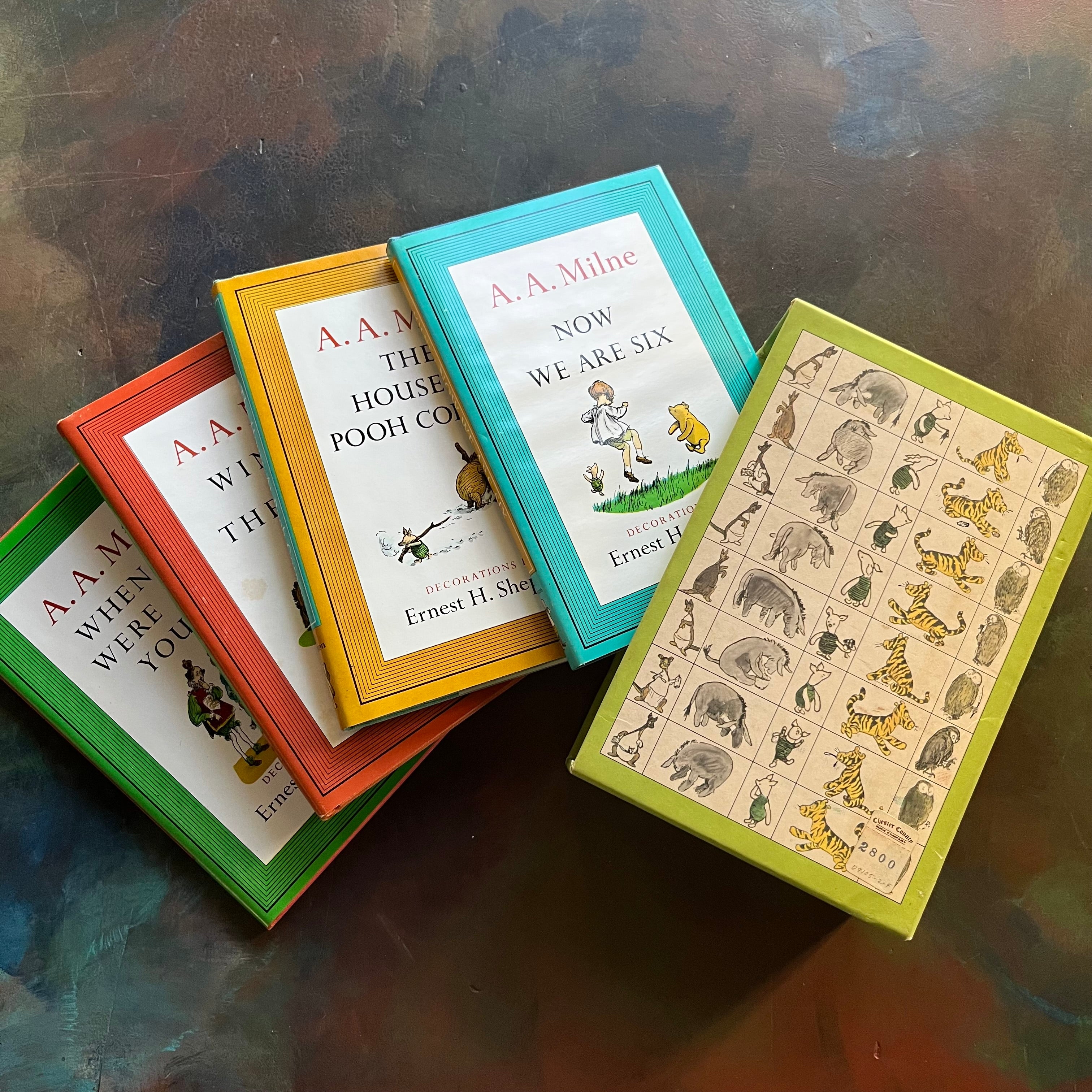 Pooh's Library - Winnie the Pooh Box Set-A. A. Milne-E. H. Shepard-read aloud revival books-vintage children's short stories-view of the dust jacket covers along with the side of the box