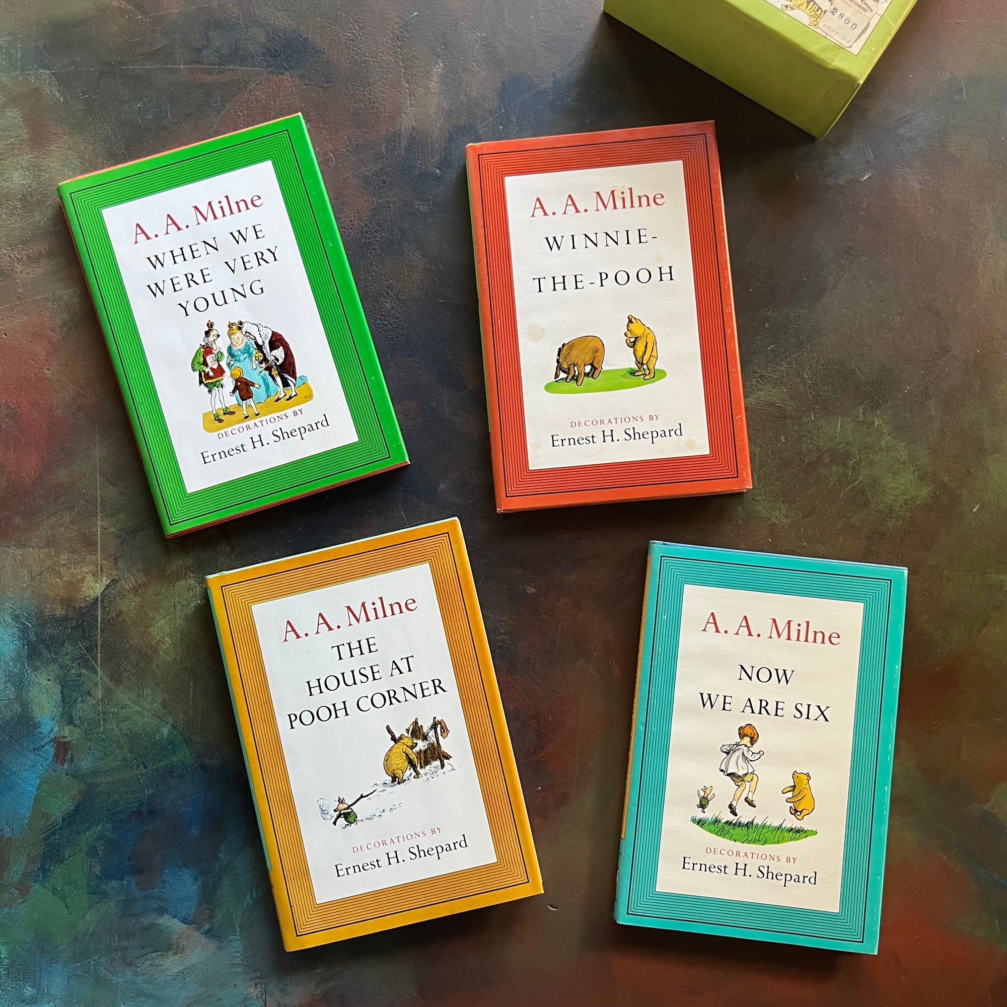 Pooh's Library - Winnie the Pooh Box Set-A. A. Milne-E. H. Shepard-read aloud revival books-vintage children's short stories-view of the dust jacket covers - each with an illustration in color from inside that edition