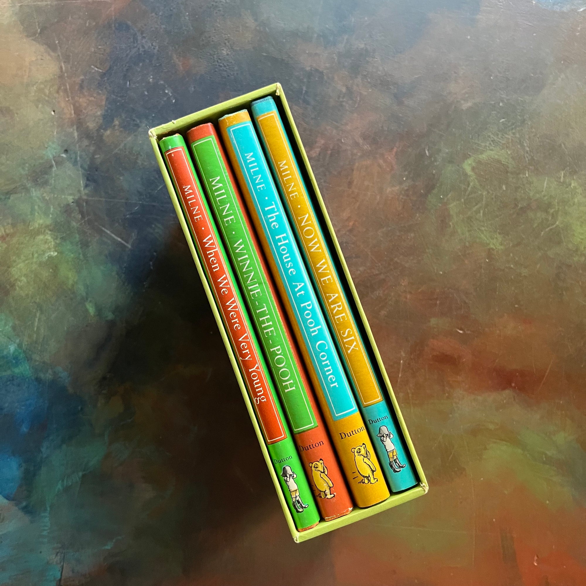 Pooh's Library - Winnie the Pooh Box Set-A. A. Milne-E. H. Shepard-read aloud revival books-vintage children's short stories-view of the dust jacket spines in bright colors